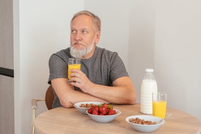 elderly man eating healthy food