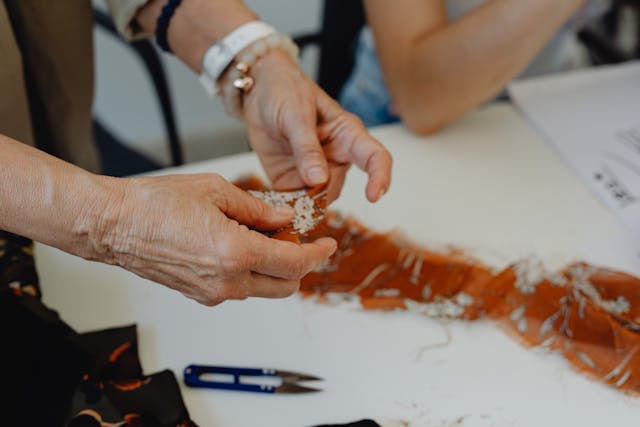 senior woman Holding a Cloth to craft